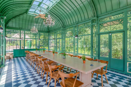 Affinitee at Stone Mountain Apartments photo of the pavillon with a long table and chairs